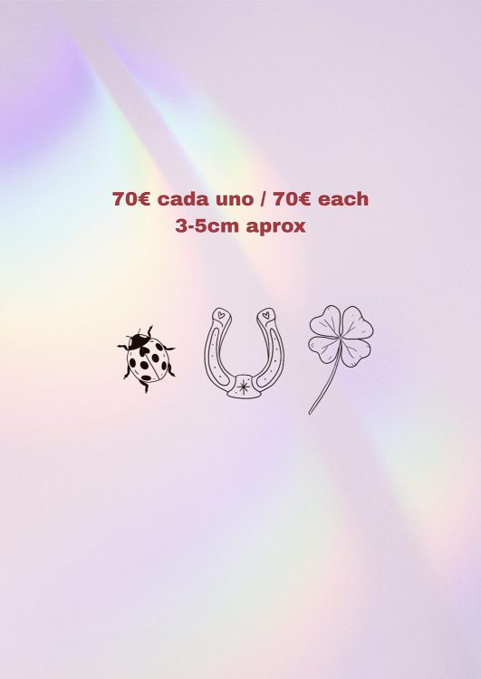 Amuletos de la suerte: mariquita, herradura, trébol.